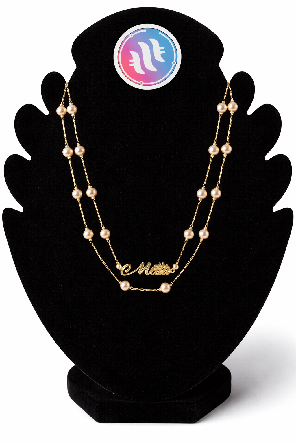 69a6773a6497d13f7600b15f_elegant-gold-pearl-necklace-with-metta-_1773907671775.png